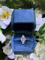 14k Vintage ring with approximately .70 carats of old cut diamonds in yellow and white gold.