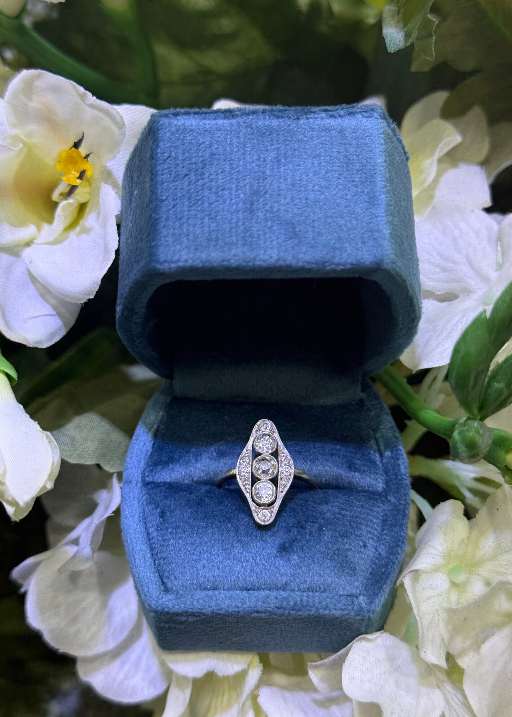 14k Vintage ring with approximately .70 carats of old cut diamonds in yellow and white gold.