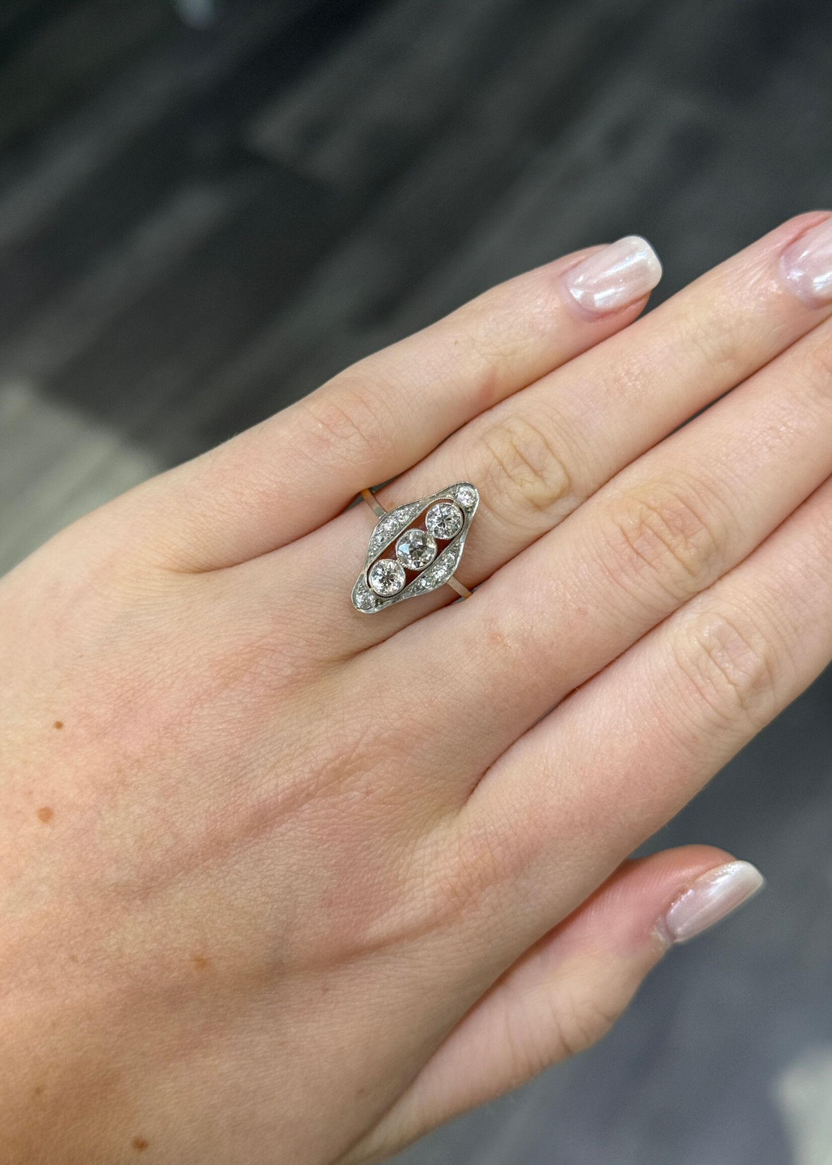 14k Vintage ring with approximately .70 carats of old cut diamonds in yellow and white gold.