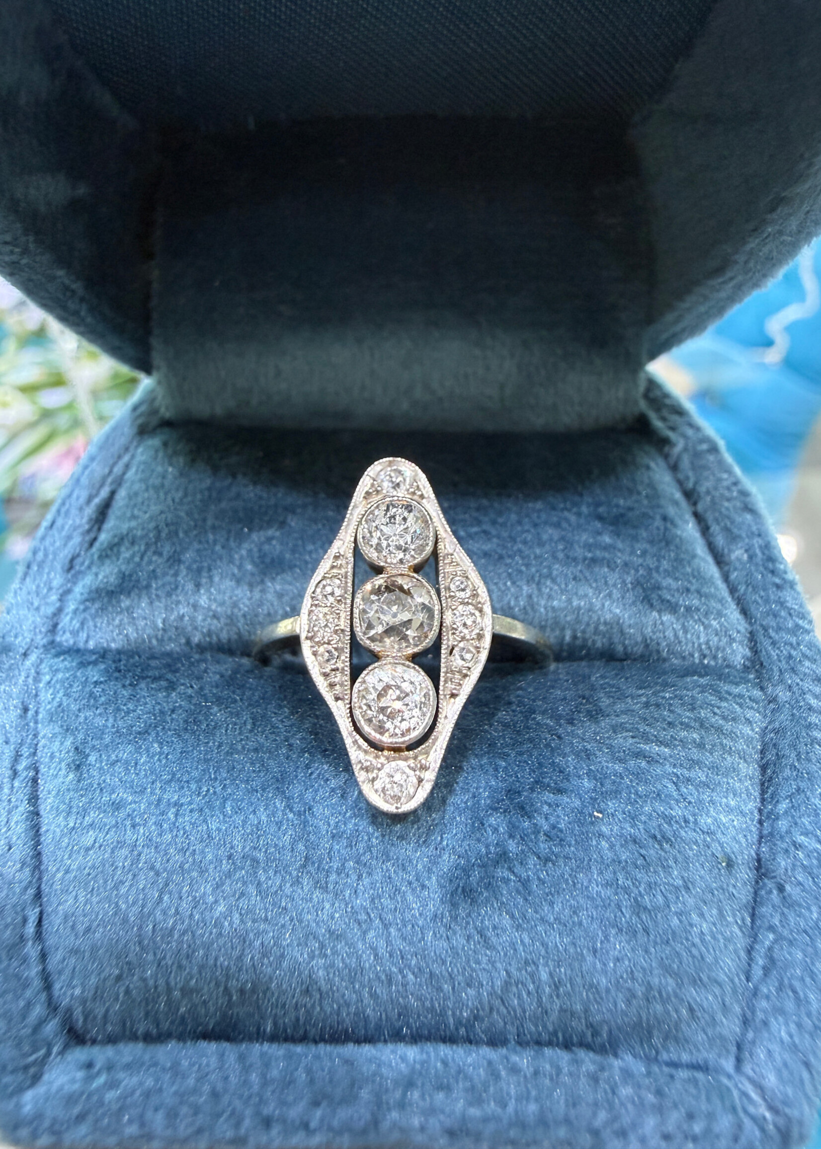 14k Vintage ring with approximately .70 carats of old cut diamonds in yellow and white gold.