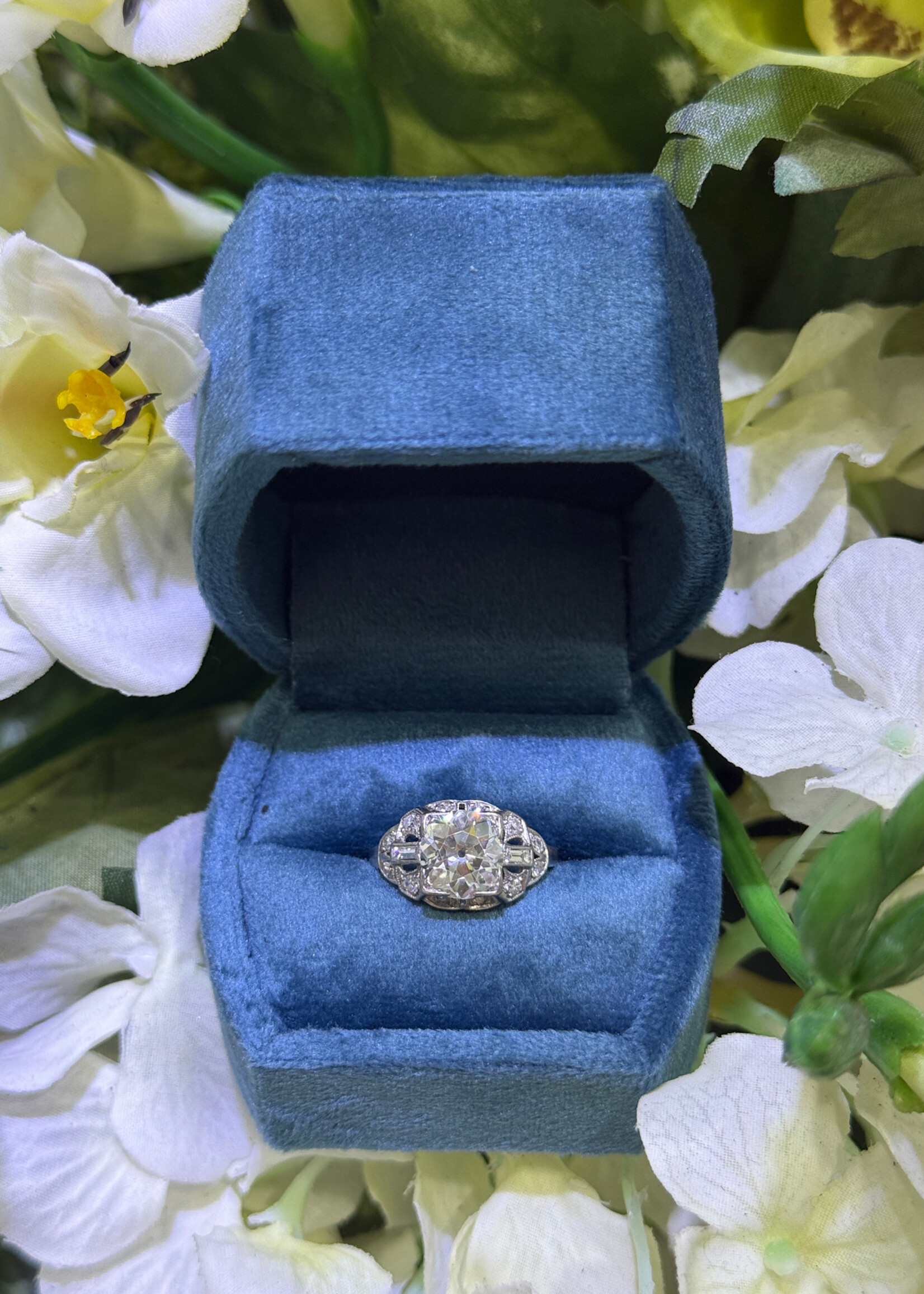 Platinum 2ct+ European Cut Diamond with baguette and round diamond accents.