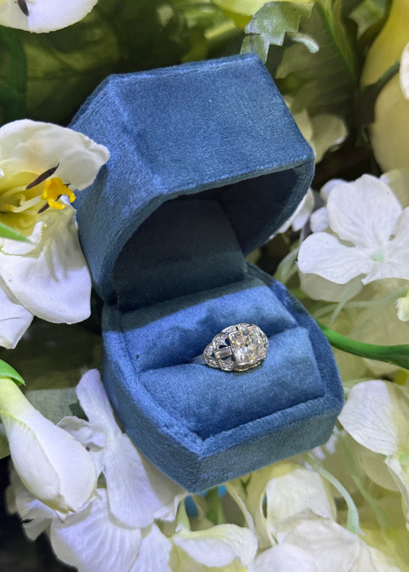 Platinum 2ct+ European Cut Diamond with baguette and round diamond accents.