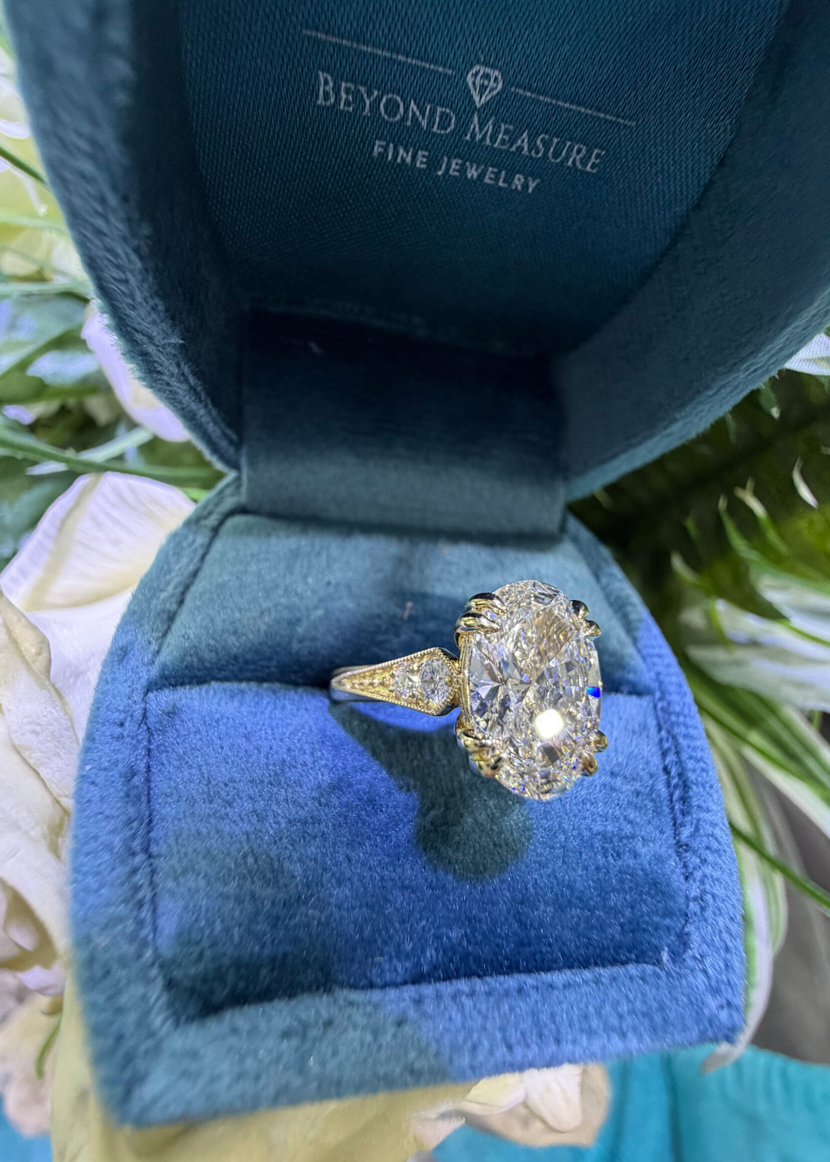14kY 3ct Oval LabGrown Diamond F,VS1 + 1/5ctw milgrain and engraved details.
