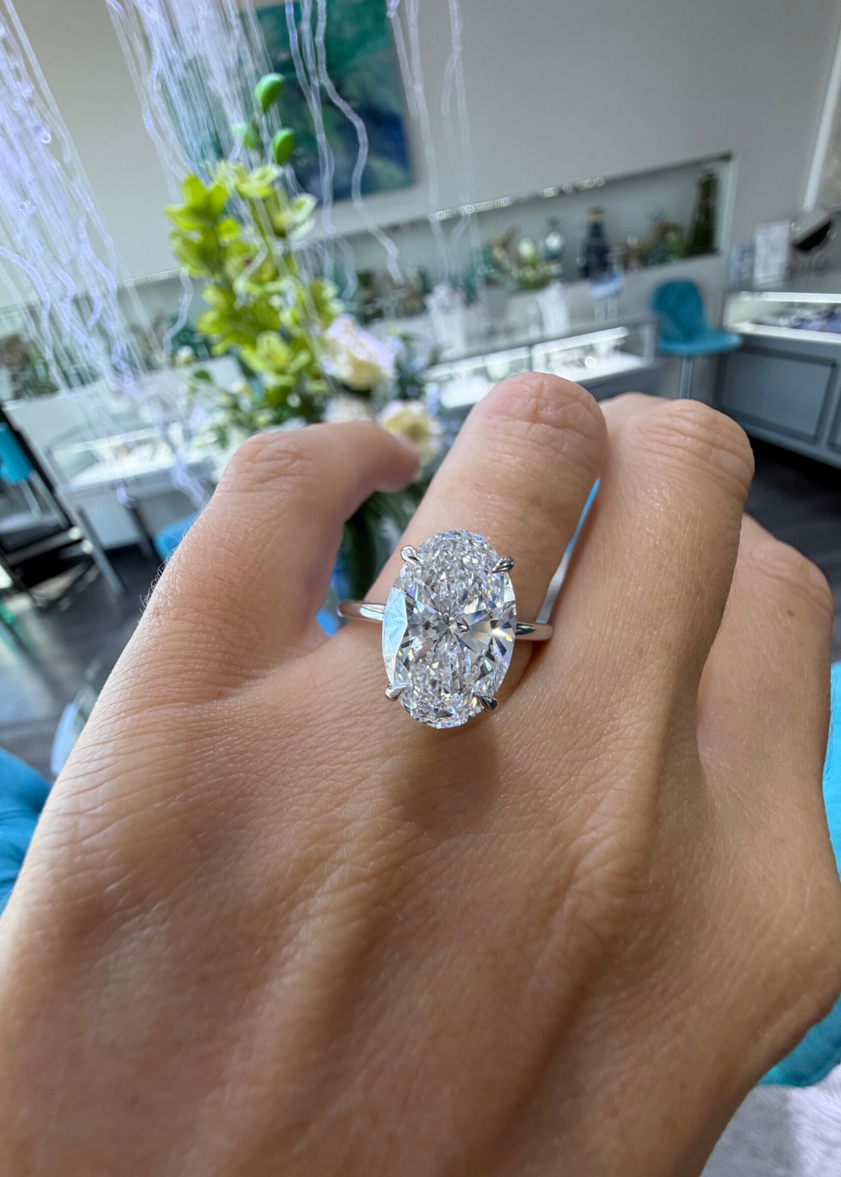14k White Gold 4.01ct Oval Cut Labgrown diamond solitaire engagement ring. D,VS2 with hidden halo.