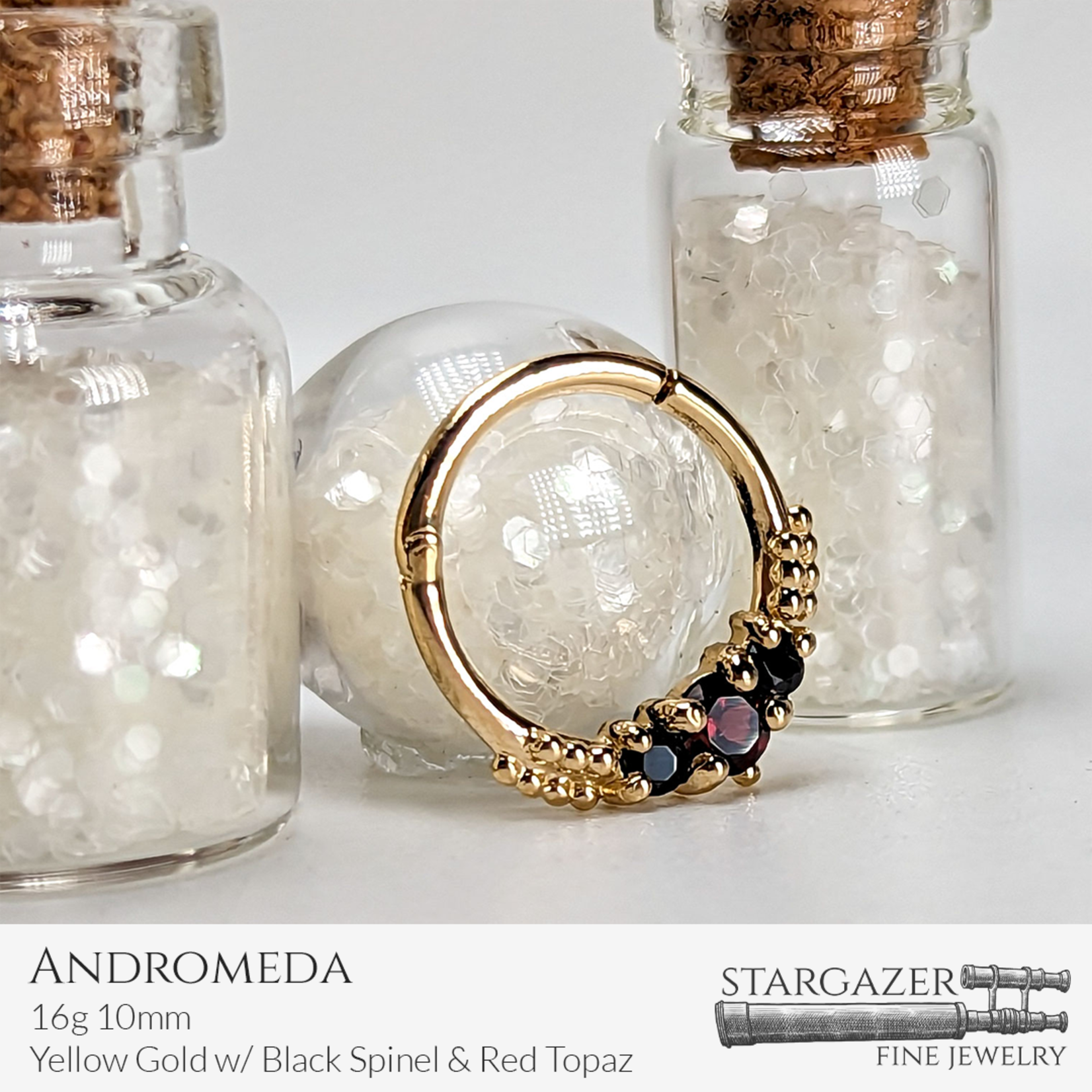 Andromeda 16g 10mm; Yellow Gold with Black Spinel and Blazing Red Topaz