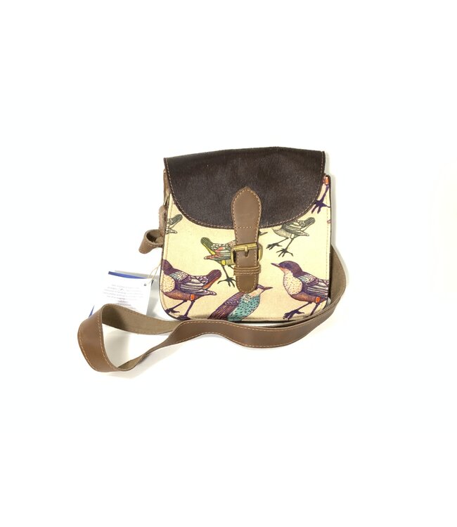 Cottn Curls Using the finest qualities of Cotton Fabrics & Canvas and pairing with superior leather and beautiful prints