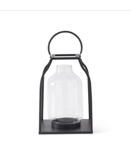 K&K Interiors 14.25 Inch Black Metal Trapezoid Lantern w/Glass Hurricane