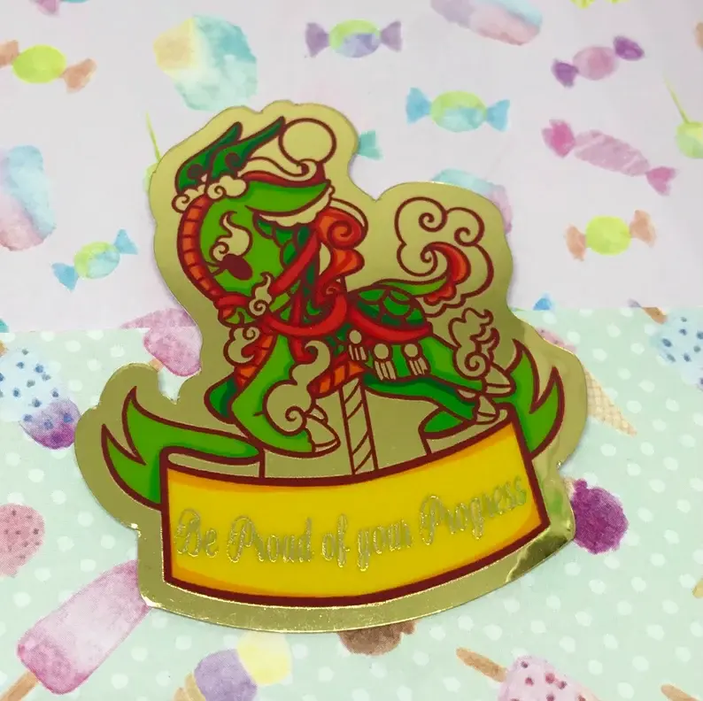 Care-ousal Gold Chrome stickers Be Proud - Rolling Tales