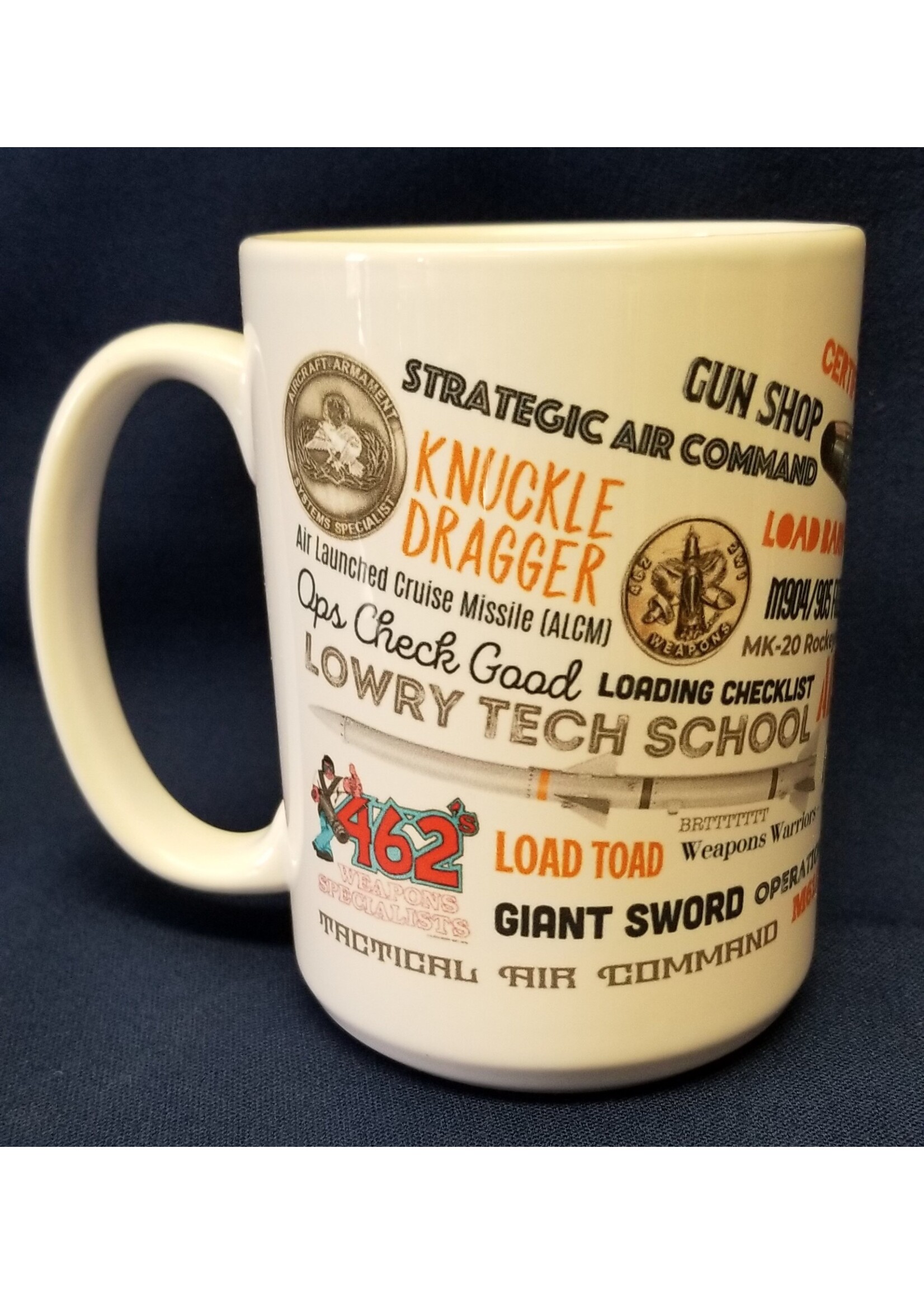 https://cdn.shoplightspeed.com/shops/649725/files/55089102/1652x2313x2/doug-keeney-mug-weapons-lingo-15-ounce.jpg