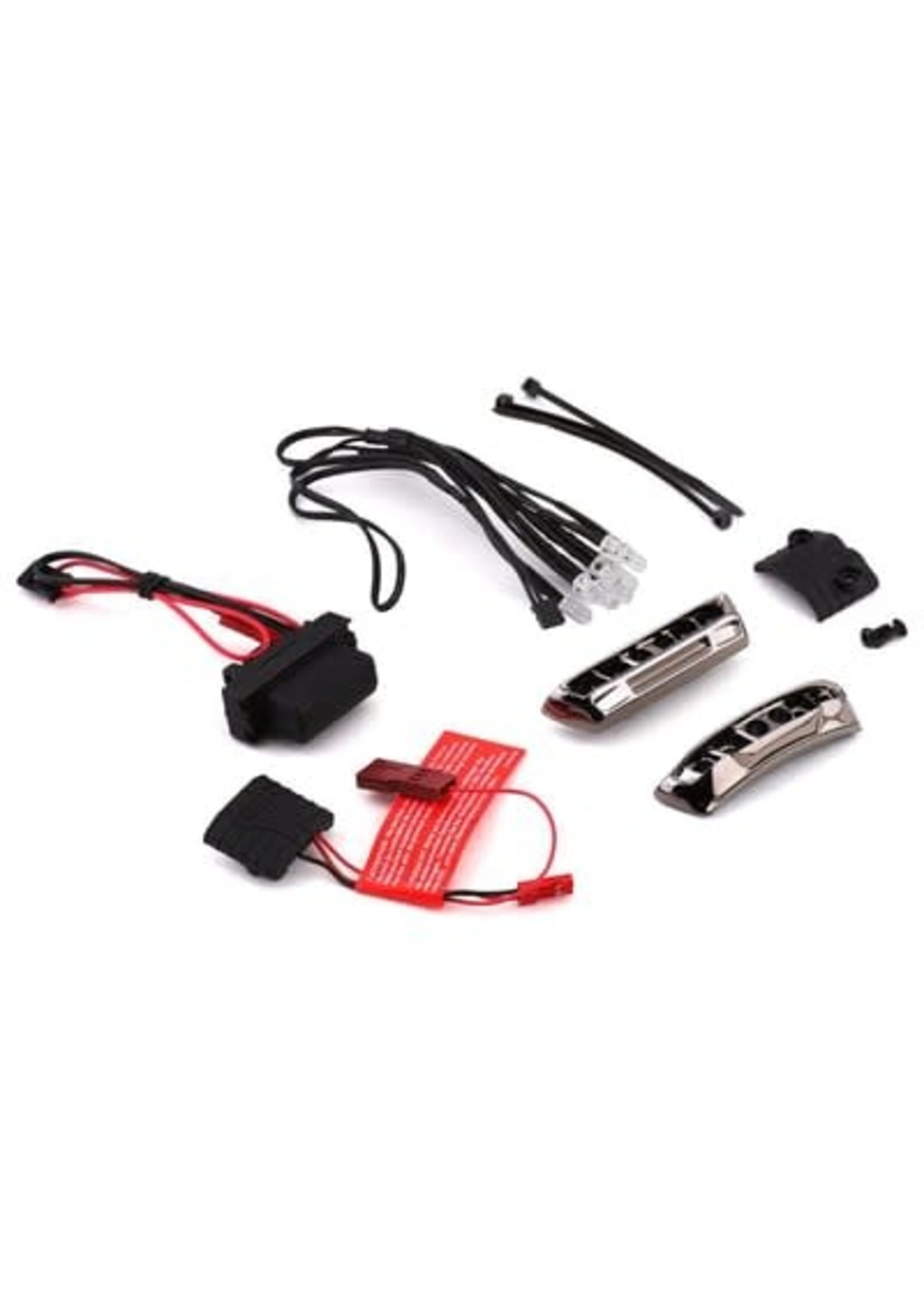 Traxxas 7185A The Traxxas Complete LED Light Kit for the 1/16 scale E-Revo adds four LEDs on the front bumper, and blazes a path through the night. Four red LEDs in the rear bumper let you track progress from behind. A tightly regulated power supply prevents flic