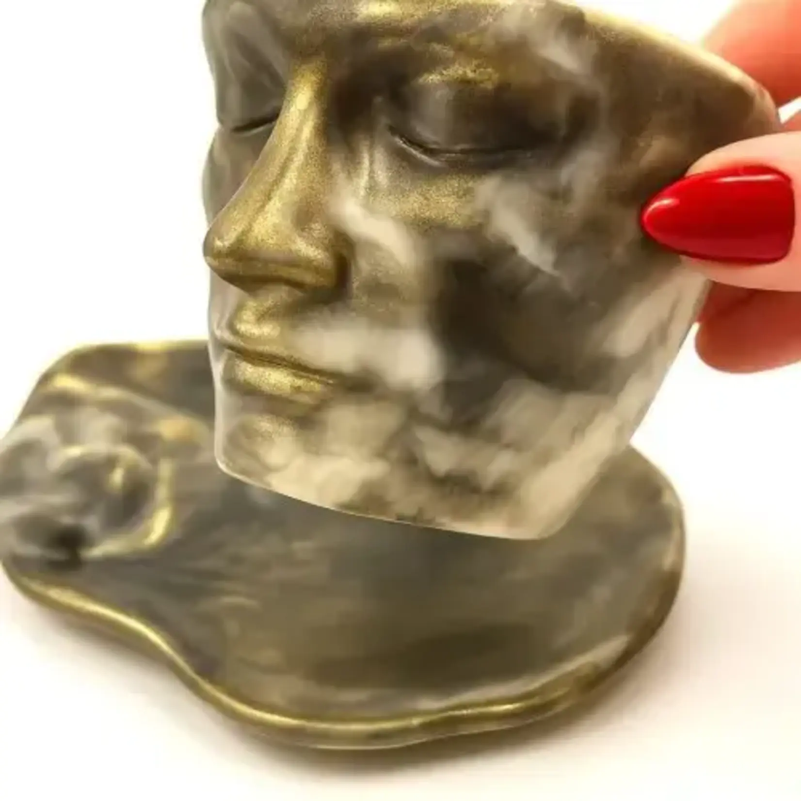 SCULPTED FACE EPOXY CUP AND SAUCER SET