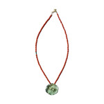 HAND CARVED NATURAL STONE PENDANT