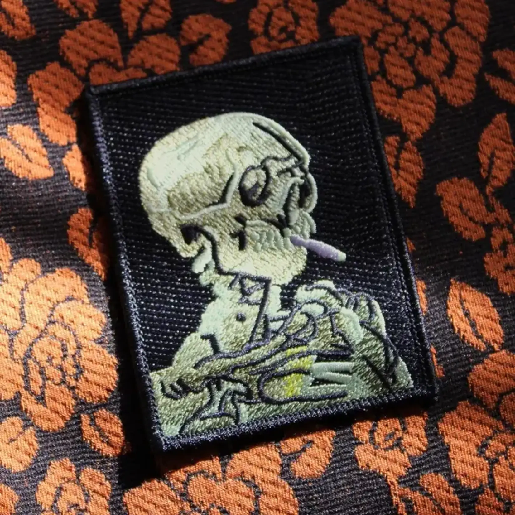 SKULL OF A SKELETON WITH BURNING CIGARETTE PATCH