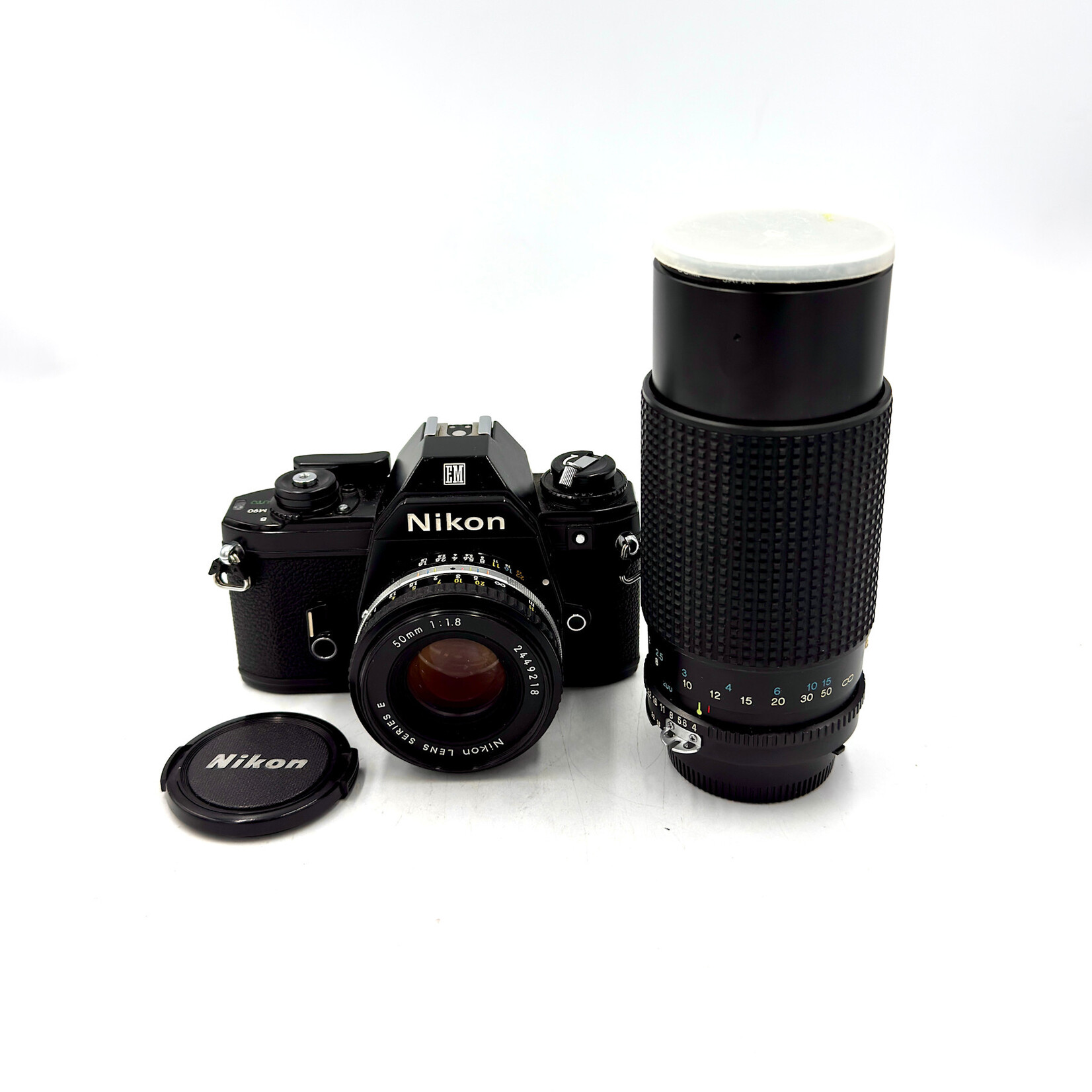 Canon #1550 USED Nikon EM w/ 50mm f/1.8 & Tokina 80-200