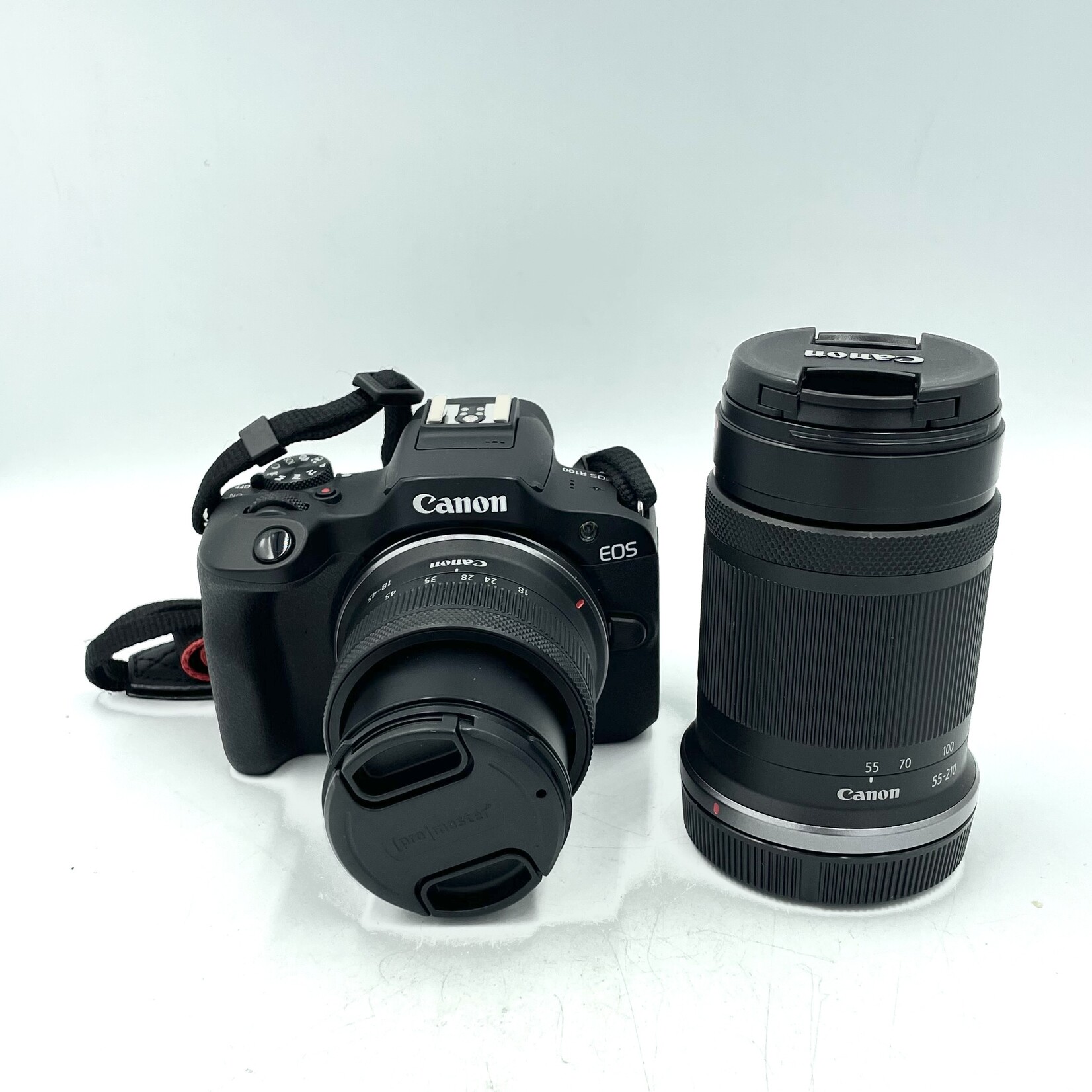 Canon #1635 Canon r100 with 18-45mm and 55-210mm (USED)