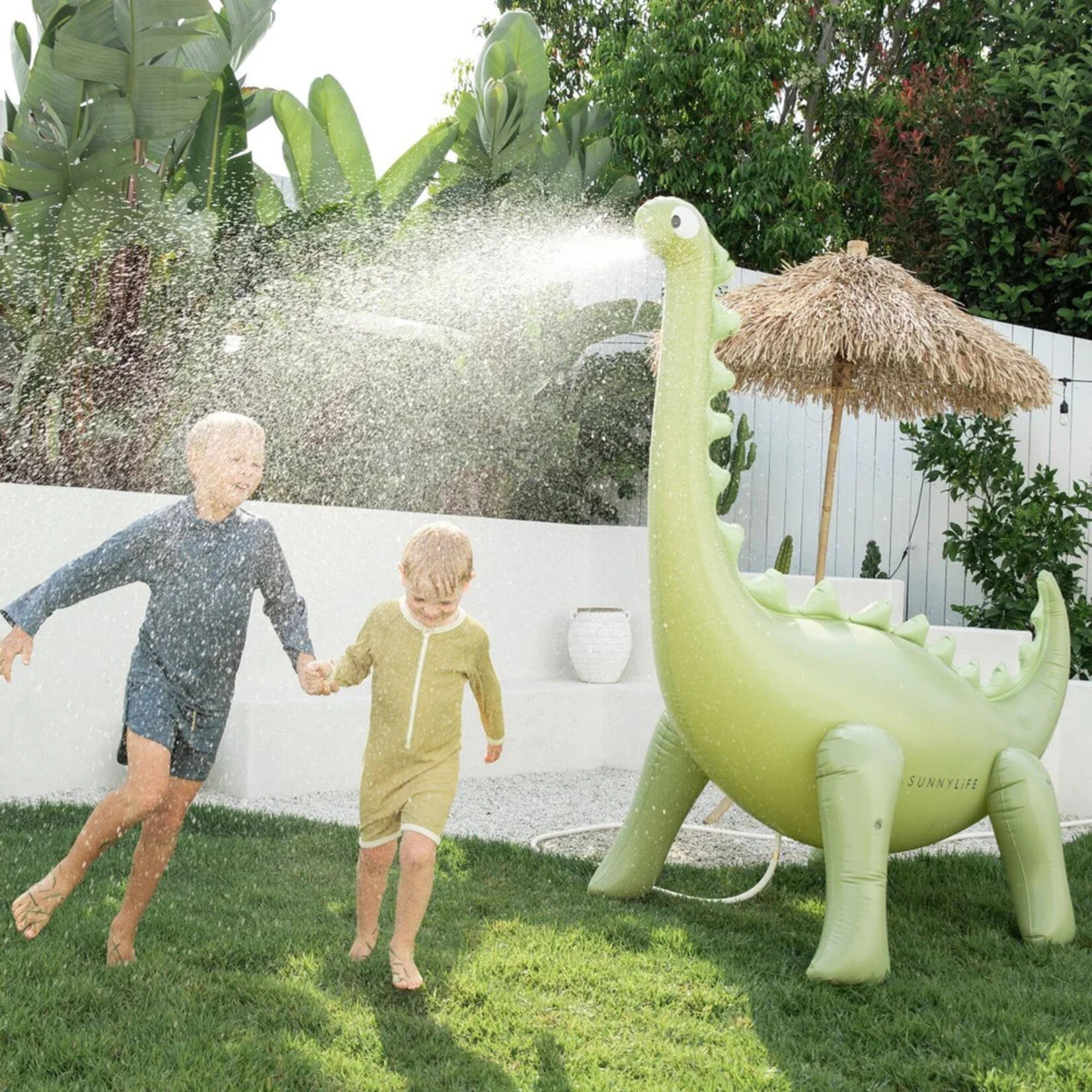 Sunnylife Inflatable Sprinker- Giant Dino Into the Wild