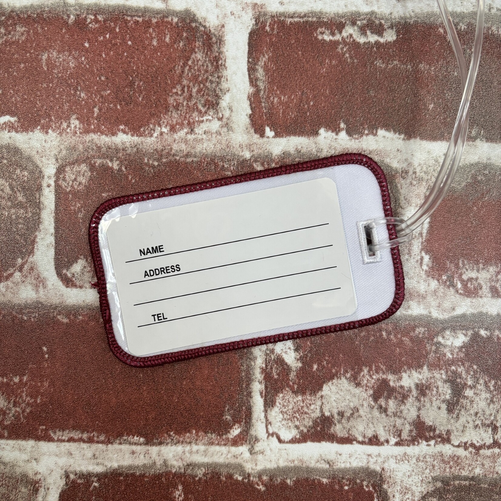 Neil Embroidered Luggage Tag - Julia Gash artwork