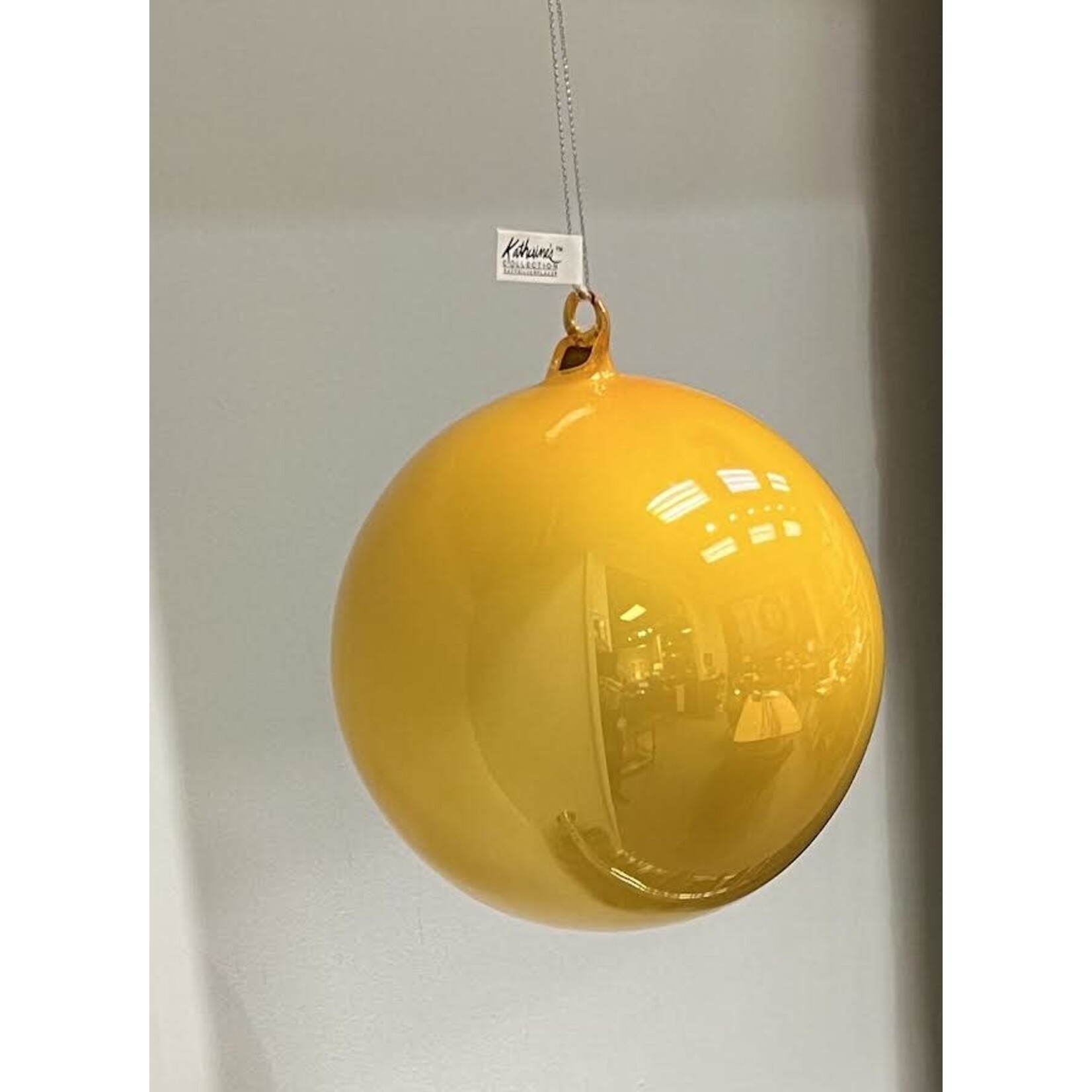 Katherine's Collection Journey Pearlized Yellow Glass Ball Ornament