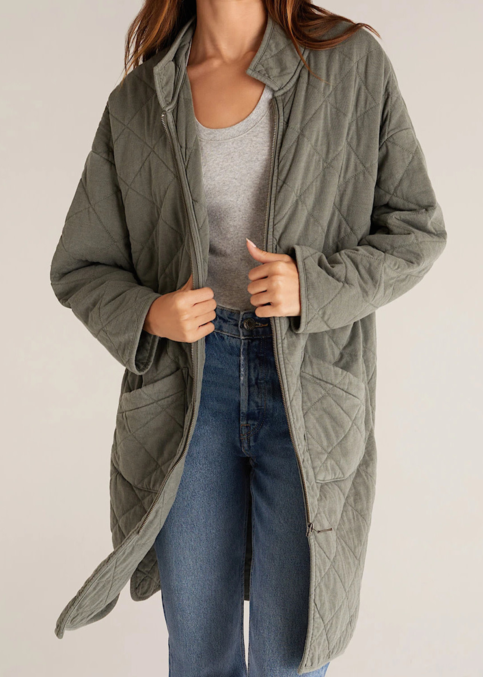 green quilted jacket