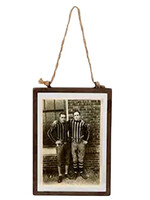 Two men hanging frame
