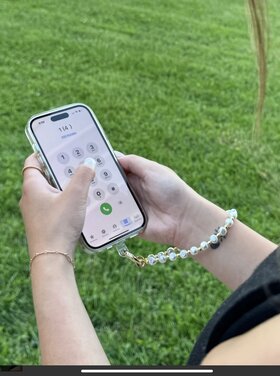 Save The Girls Beaded wristlet phone holder