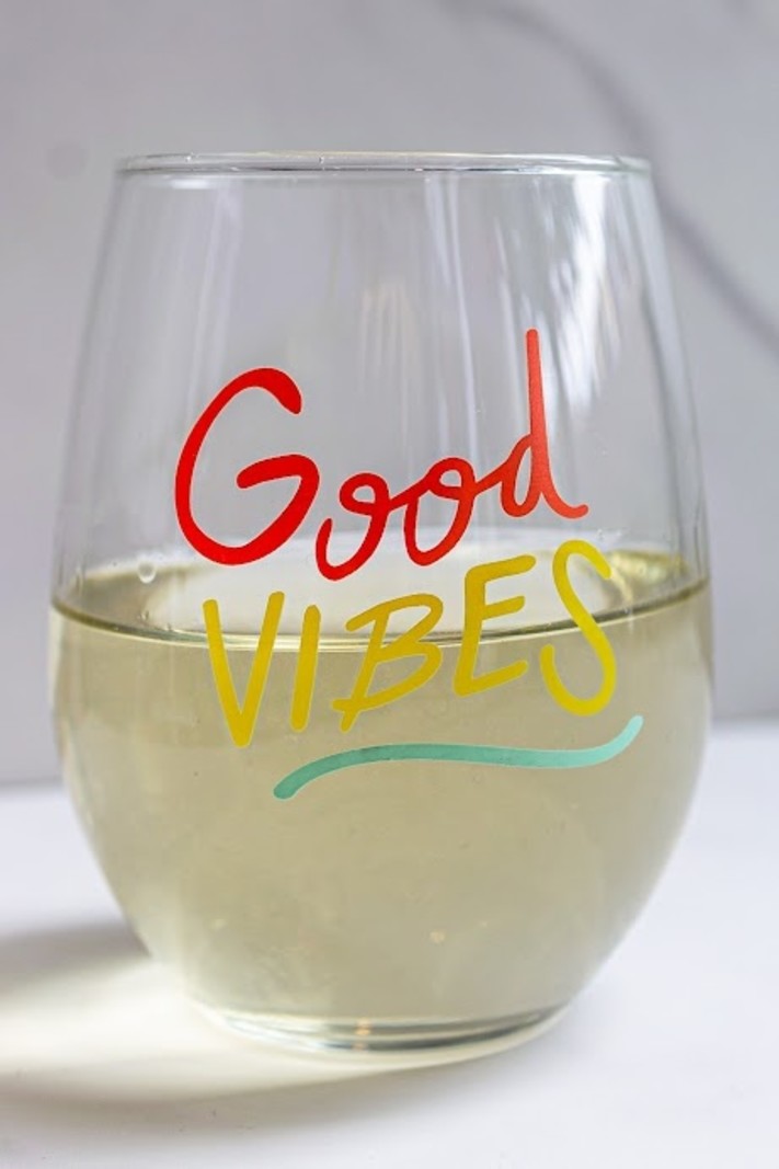 Love, Charlie Merch Good Vibes Wine Glass