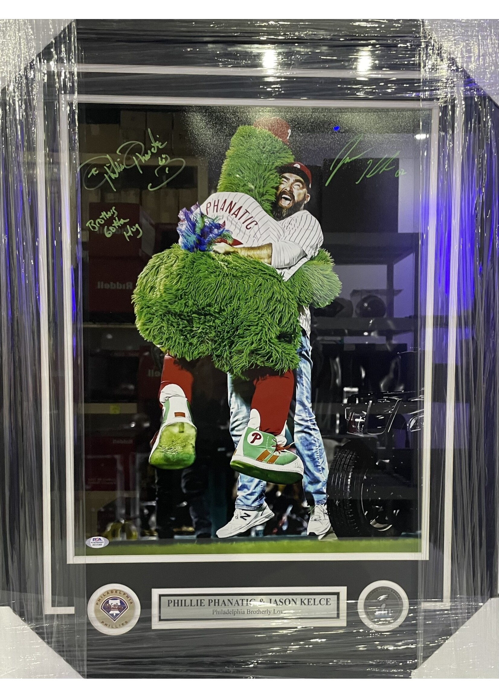 Jason Kelce hugs Phillie Phanatic Philadelphia Phillies shirt