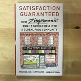 Micheline Maynard - Satisfaction Guaranteed: How Zingerman’s Built A Corner Deli Into A Global Food Community - Hardback (USED)