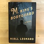Niall Leonard - M, King’s Bodyguard - Hardback (USED)