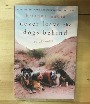 Brianna Madia - Never Leave The Dogs Behind - Hardback (NEW)