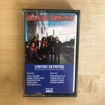 Lynyrd Skynyrd – (Pronounced 'Lĕh-'nérd 'Skin-'nérd) - Cassette (USED)