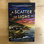 Malinda Lo - A Scatter Of Light - Hardback (USED)