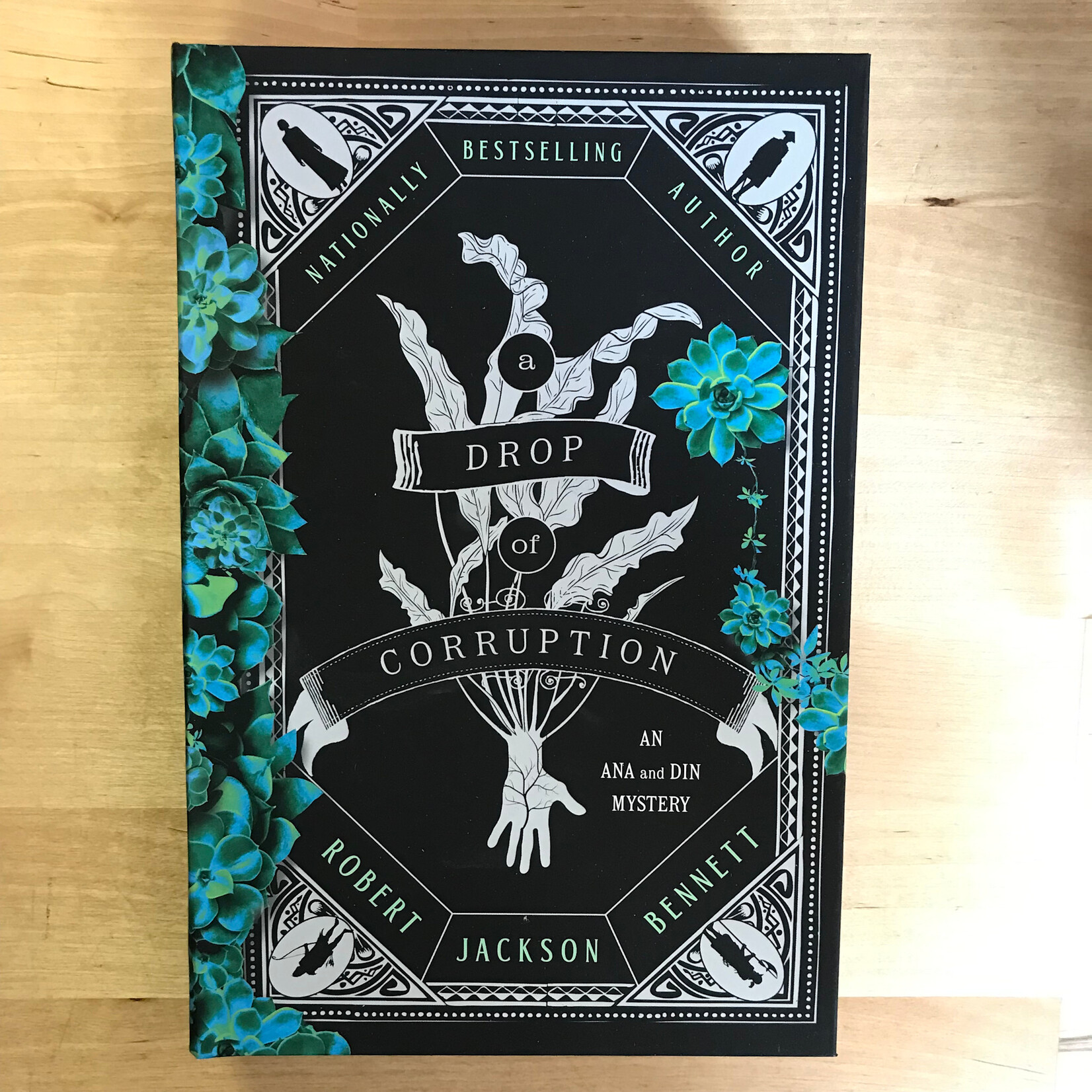 Robert Jackson Bennett - A Drop Of Corruption - Hardback (NEW)