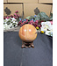 Peach Calcite Sphere #8, 558gr, 72.9mm
