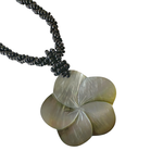 NB1 Island Shell Necklace Carved Flower with Black Beads NB1 Island Shell Necklace Carved Flower with Black Beads