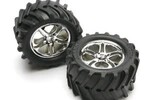 Traxxas 5173 Tires & wheels, assembled, glued (SS (Split-Spoke) chrome wheels, Maxx® Chevron tires, foam inserts) (2) (fits Revo®/T-Maxx®/E-Maxx with 6mm axle and 14mm hex)