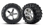 Traxxas 4973R Tires & wheels, assembled, glued (Hurricane chrome wheels, Maxx® tires (6.3' outer diameter), foam inserts) (2) (fits Revo®/T-Maxx®/E-Maxx with 6mm axle and 14mm hex)