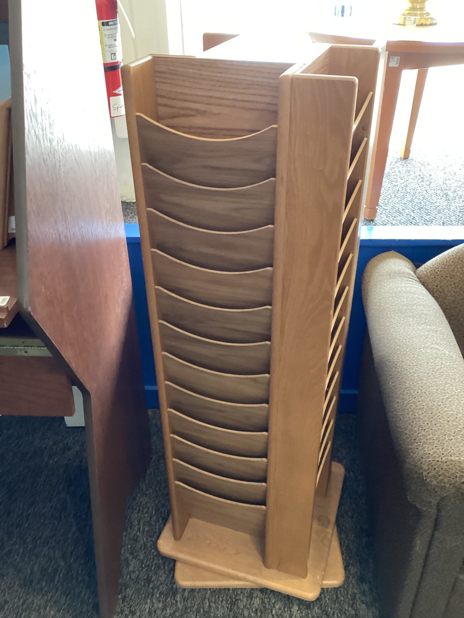 Rotating magazine rack wooden GVSU Surplus Store