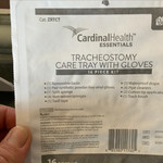 Tracheostomy care tray with gloves