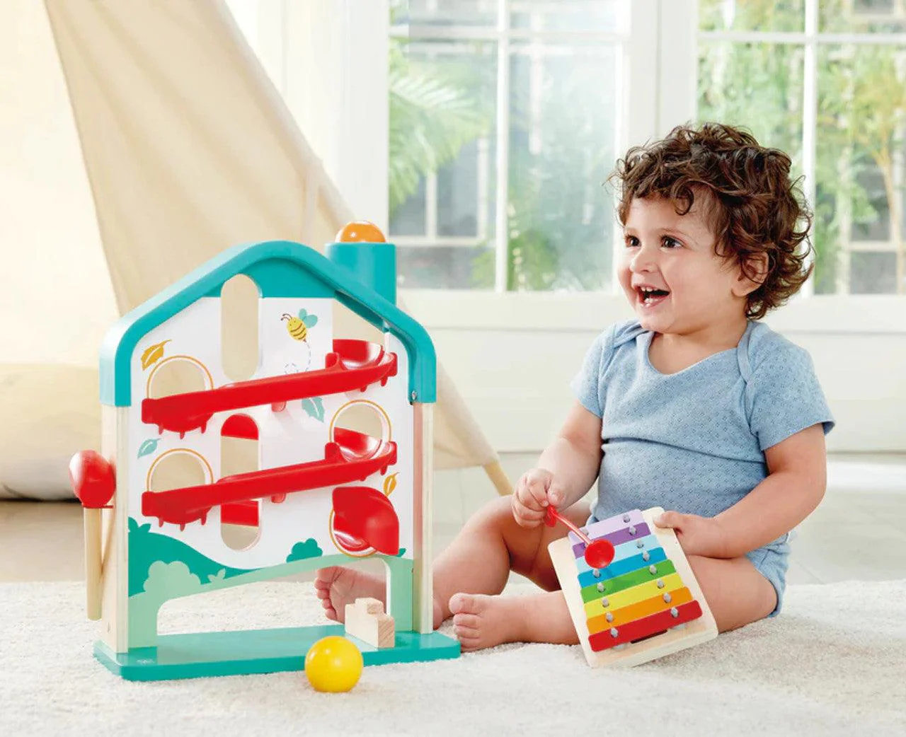 Hape Hape Toboggan musical en forme de maison