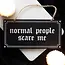 Quirky Charm: Normal People Scare Me Sign