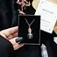 Obsidian Magic: Potion Bottle Necklace!