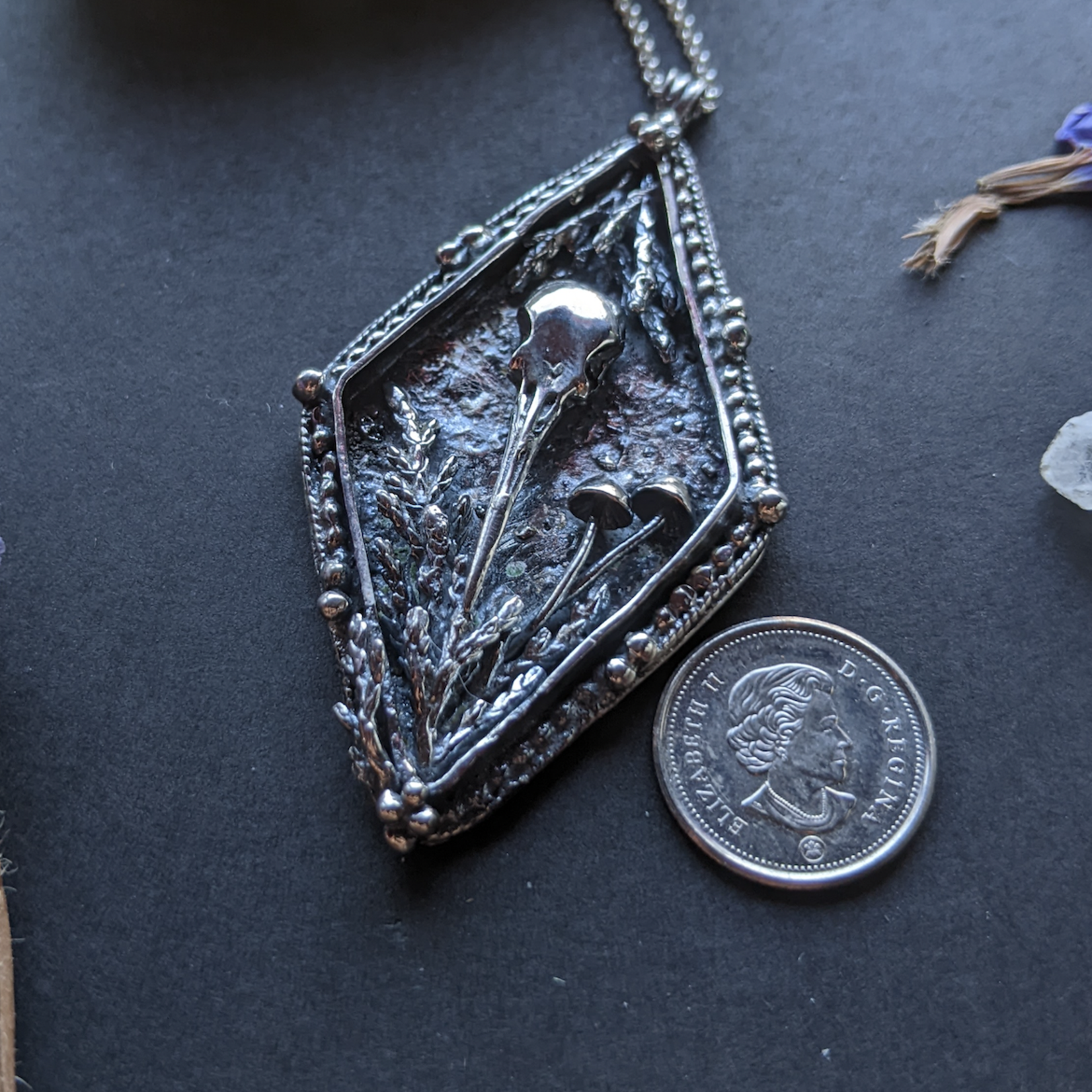 Diamond Shaped Hummingbird Skull Necklace · Silver