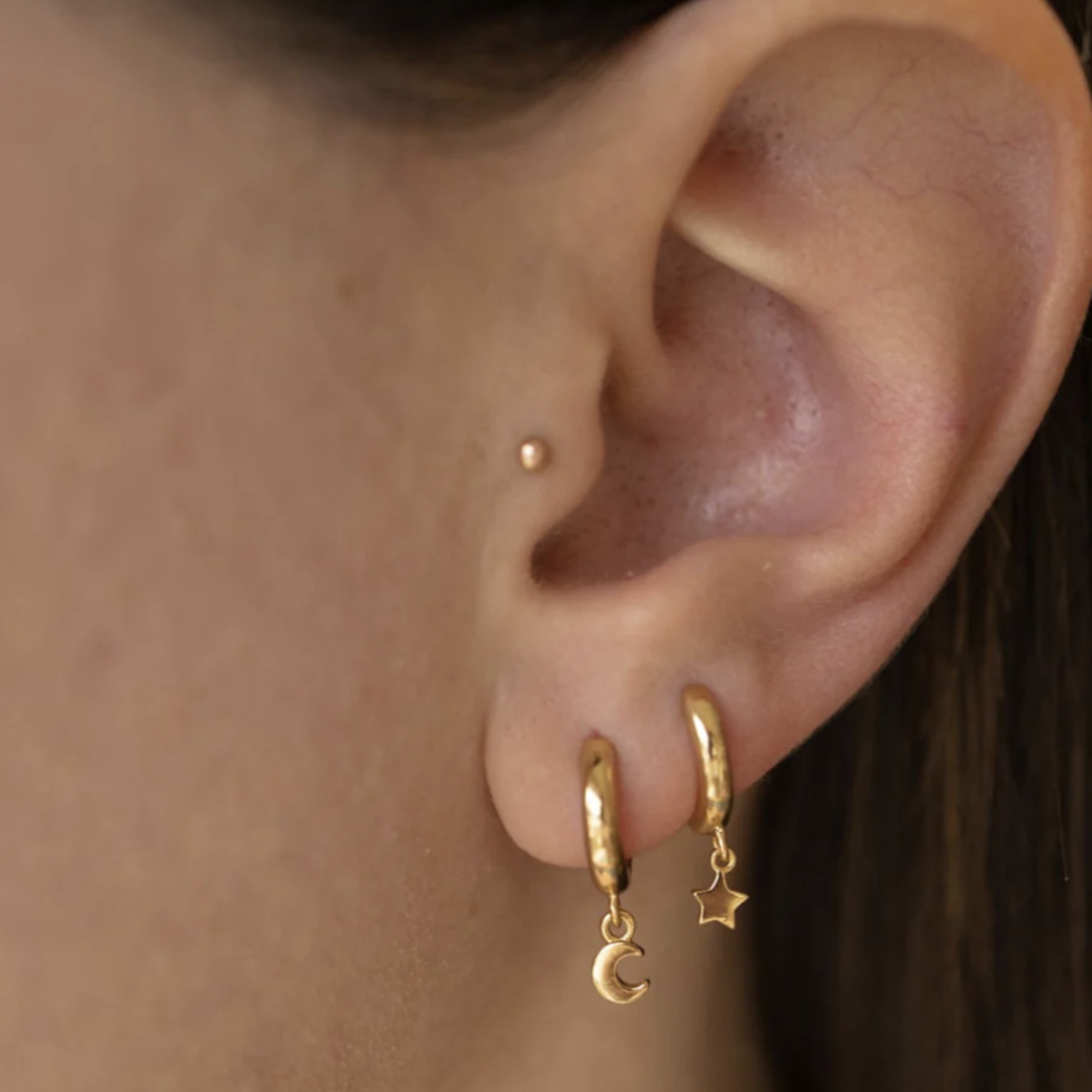 Star and Moon Huggie Hoop Earrings · Gold