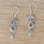 Dramatic Dragons Dangle Earrings · Silver