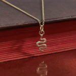 *Tiny Snake Charm Necklace · 14K Gold