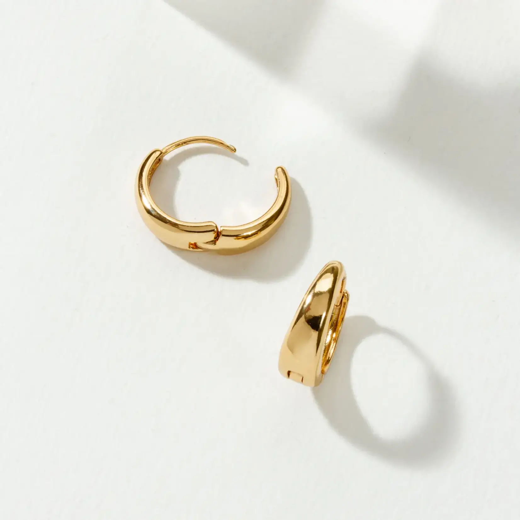 Elevated Huggie Earrings · 14K Gold Plating