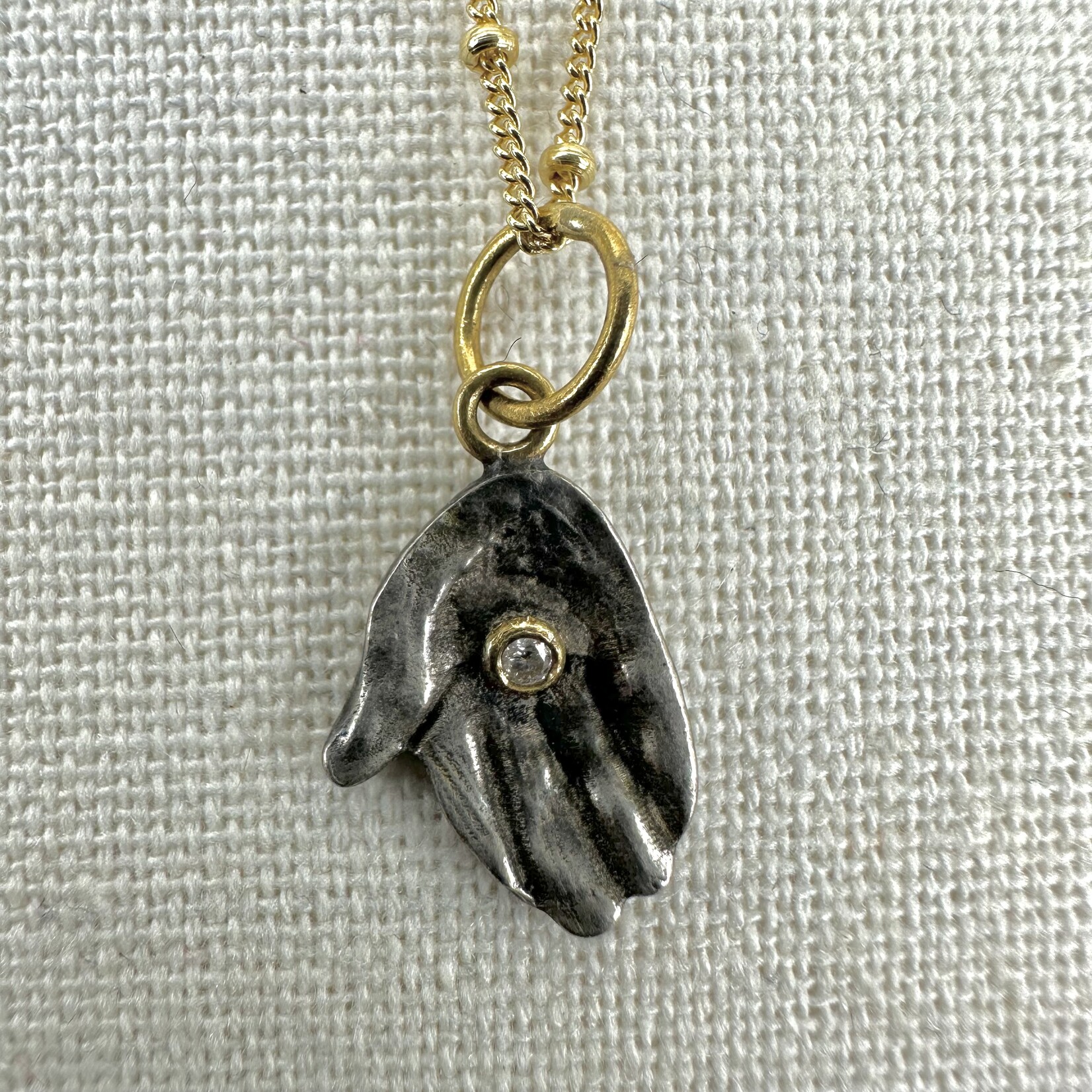 Prehistoric Works Giver Hand w/Diamonds · 24K Gold & Silver