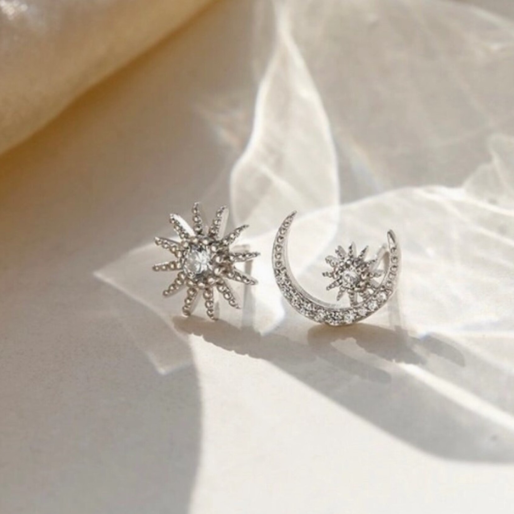 Happyzzzsu Asymmetrical Star and Moon Stud Earrings · Silver