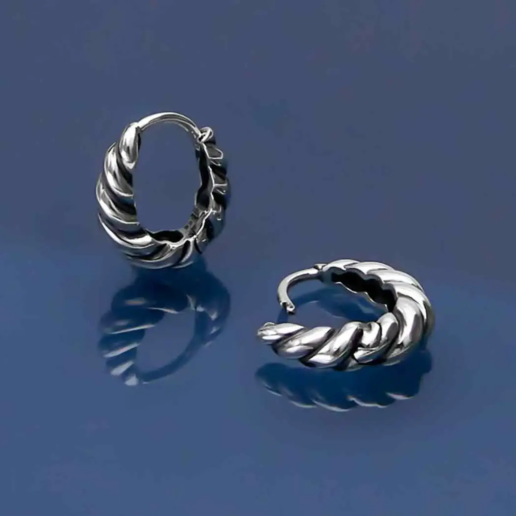 Twisted Teardrop Huggie Hoops · Silver